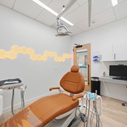 Regional Implant Centers - Modern and comfortable exam room designed for a calm, stress-free dental experience.