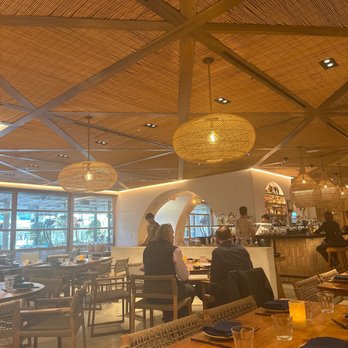Kassi Beach - Lamps and bamboo warm up the interior - Italian Near Me - Las Vegas, Nevada