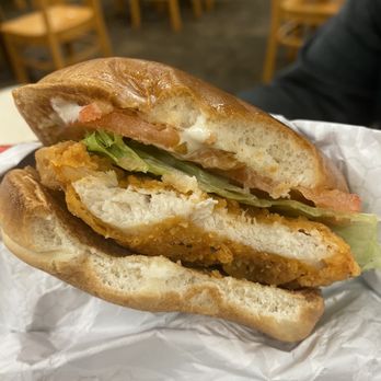 Wendy's - a chicken sandwich with lettuce and tomato - Fast Food Near Me - Coquitlam, British Columbia Wendy's - a chicken sandwich with lettuce and tomato - Fast Food Near Me - Coquitlam, British Columbia