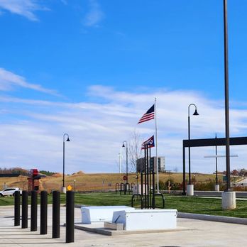 Sheetz - an empty parking lot with american flags - Convenience Stores Near Me - New Concord, Ohio Sheetz - an empty parking lot with american flags - Convenience Stores Near Me - New Concord, Ohio