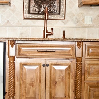 No Limit Remodeling - Roap newels with  Inlay over sink, 6 x 6 travertine back splash with pencil inlay and 4 x 4 travertine on diagonal. - General Contractors Near Me