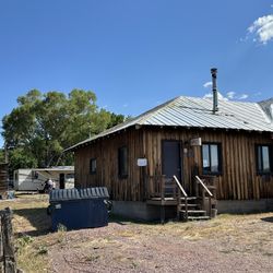 Griswold’s Alpine Cabins - Front office with dumpster available.