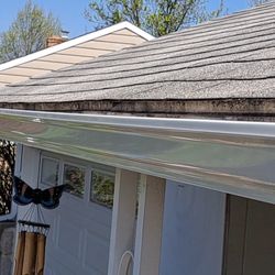 Blue Ribbon Gutters - Beautiful, Shiny, New Seamless Gutters show off your house!