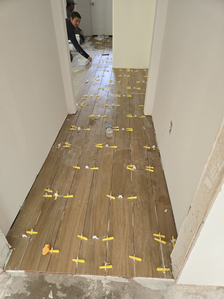 Slide of ME Roofing Company