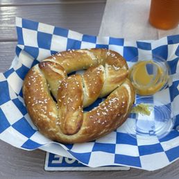 Pretzel with mustard and beer cheese Pretzel with mustard and beer cheese
