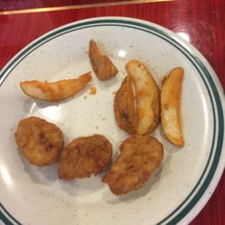 China Star - Here is some of the breaded card aid they call nuggets. The potatoes were cold rubber. As you can see the kids didn't touch it.