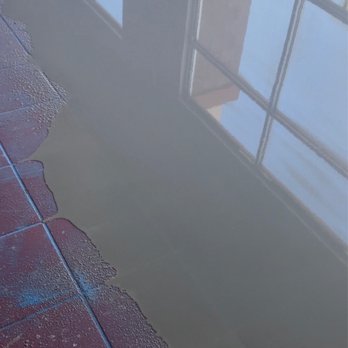 Excellent Floors - We are starting the project pouring on Schonox XM self-leveler over the tile. - Flooring Near Me - Las Vegas, Nevada Excellent Floors - We are starting the project pouring on Schonox XM self-leveler over the tile. - Flooring Near Me - Las Vegas, Nevada