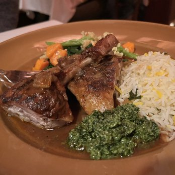 Chez Panisse - Parsi style braised duck with cardamom rice, gingery cauliflower and cilantro-coconut chutney - New American Near Me - Berkeley, California Chez Panisse - Parsi style braised duck with cardamom rice, gingery cauliflower and cilantro-coconut chutney - New American Near Me - Berkeley, California