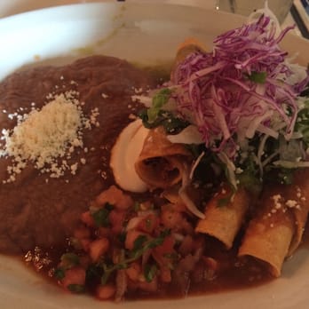 Rio Tomatlan - Taquitos with a side of refried beans - Mexican Near Me - Canandaigua, New York