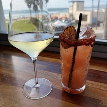 Wonderland Ocean Pub - Sauvignon Blanc and Fire Dancer Cocktail. - New American Near Me - San Diego, California Wonderland Ocean Pub - Sauvignon Blanc and Fire Dancer Cocktail. - New American Near Me - San Diego, California