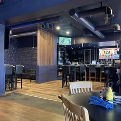 Cobalt Bar & Grill - Bar area. Lots of TVs throughout and all 6 NFL games are playing