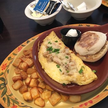 The Egg Cafe & Eatery - Ponce de Leon, "a cream cheese & tomato filled omelette with fresh crabmeat sauteed in garlic butter, topped with melted jack &scallions" - Cafes Near Me - Tallahassee, Florida The Egg Cafe & Eatery - Ponce de Leon, "a cream cheese & tomato filled omelette with fresh crabmeat sauteed in garlic butter, topped with melted jack &scallions" - Cafes Near Me - Tallahassee, Florida