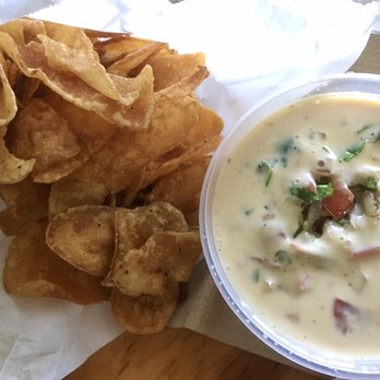 Koop's BBQ Kitchen & Catering - Brisket queso w/ homemade chips - Barbeque Near Me - Galveston, Texas Koop's BBQ Kitchen & Catering - Brisket queso w/ homemade chips - Barbeque Near Me - Galveston, Texas