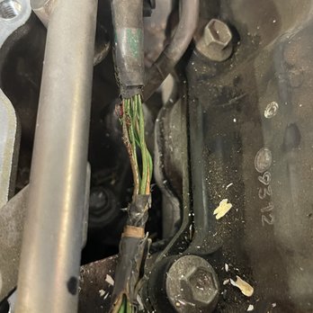 Titan Automotive - This is the area where rats chewed through my wiring harness - Auto Repair Near Me - Orange, California Titan Automotive - This is the area where rats chewed through my wiring harness - Auto Repair Near Me - Orange, California