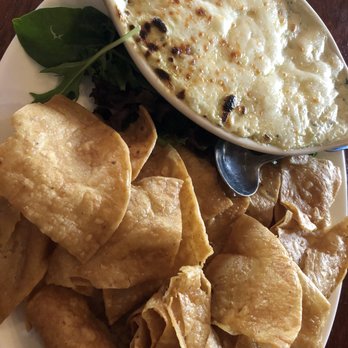 Olympic Tavern - Spinach artichoke dip is gooey and delicious! - Barbeque Near Me - Rockford, Illinois Olympic Tavern - Spinach artichoke dip is gooey and delicious! - Barbeque Near Me - Rockford, Illinois