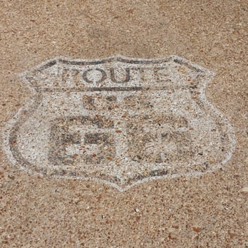 Wagon Wheel Motel - Rt. 66 insignia painted on the driveway - Hotels Near Me - Cuba, Missouri