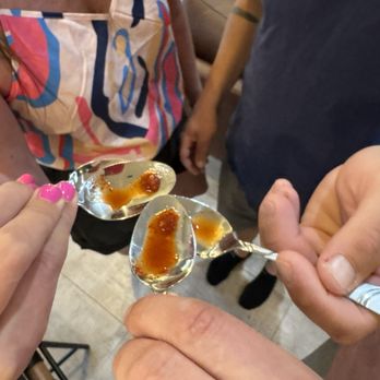 Tucson Private Chef - Sampling hot sauce from South Africa - Caterers Near Me