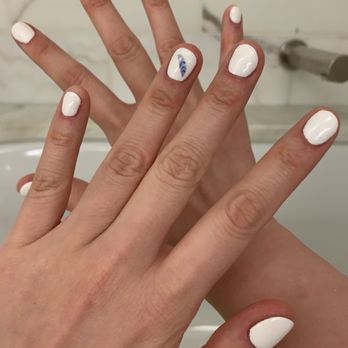 Nail WAH - Gel manicure in white with feather stickers. - Nail Salons Near Me - New York, New York Nail WAH - Gel manicure in white with feather stickers. - Nail Salons Near Me - New York, New York