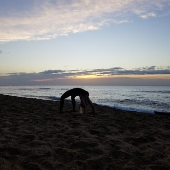 Kauai Yoga on the Beach - Pre-sunrise yoga warm-up at Kauai Shores Hotel beach - Yoga Near Me - Kapaa, Hawaii Kauai Yoga on the Beach - Pre-sunrise yoga warm-up at Kauai Shores Hotel beach - Yoga Near Me - Kapaa, Hawaii