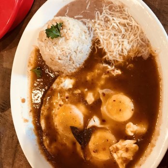 Cafe De Olla - Huevos Rancheros-- 3 eggs over tortilla with ranchero sauce, brown rice, and tasty beans - American Near Me - Burbank, California Cafe De Olla - Huevos Rancheros-- 3 eggs over tortilla with ranchero sauce, brown rice, and tasty beans - American Near Me - Burbank, California