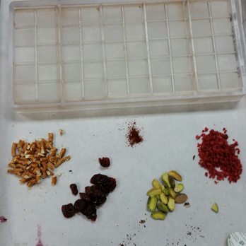 Araya Artisan Chocolate - chocolate mold and some toppings... - Chocolatiers & Shops Near Me - Katy, Texas