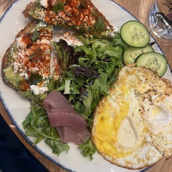 Tupelo Honey Southern Kitchen & Bar - avocado toast with feta, paprika, and a sriracha honey drizzle - Southern Near Me - Pittsburgh, Pennsylvania