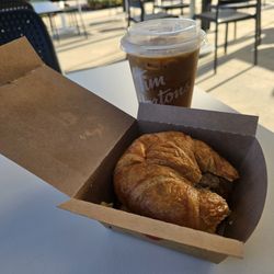 Tim Hortons - Small vanilla cream cold brew $3.39 sausage scrambled egg sandwich $4.56