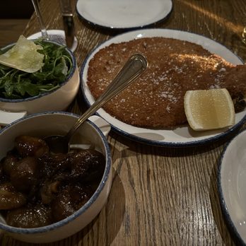 Rezdôra - Pork entree, balsamic baby onions and arugula salad w/ sliced Romano. - Italian Near Me - New York, New York Rezdôra - Pork entree, balsamic baby onions and arugula salad w/ sliced Romano. - Italian Near Me - New York, New York