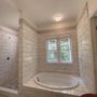 Photo of A Woman's Touch In Tile
