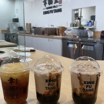 Xing Fu Tang - Left to Right: Mango Honey Black Tea & 2 orders of brown sugar boba milk tea - Bubble Tea Near Me - Alhambra, California Xing Fu Tang - Left to Right: Mango Honey Black Tea & 2 orders of brown sugar boba milk tea - Bubble Tea Near Me - Alhambra, California