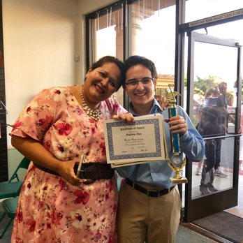 Buena Park Plaque & Trophy - Miss Elizabeth and Andrew pose for a quick pic after recitals. Good job on the Haydn Sonata, Andrew! - Signmaking Near Me - Buena Park, California