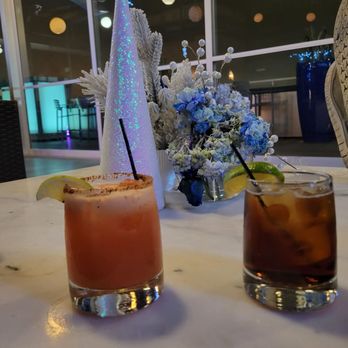 Eclipse Restaurant - two cocktails on a table - New American Near Me - St Louis, Missouri Eclipse Restaurant - two cocktails on a table - New American Near Me - St Louis, Missouri