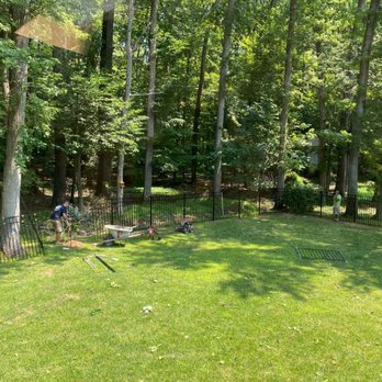 Flores Fences - A fence being installed by Flores Fence. - Fences & Gates Near Me - Neptune City, New Jersey