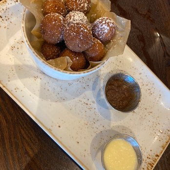 First Watch - We ordered the pumpkin donuts, they were wonderful. The light sauce is a vanilla, The brown sauce is an appley cinnamon sauce! So good! - Breakfast & Brunch Near Me - Clermont, Florida