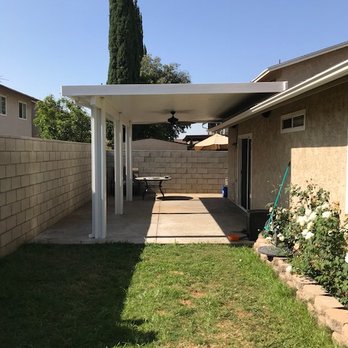 Raindrop Gutters & Patios - After... Roof mounted 12x22 Alumawood patio cover in white with fan and 4 canned lights. - Gutter Services Near Me Raindrop Gutters & Patios - After... Roof mounted 12x22 Alumawood patio cover in white with fan and 4 canned lights. - Gutter Services Near Me