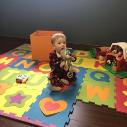 My little one in their children's waiting area. My little one in their children's waiting area.
