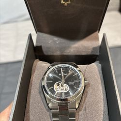 Don Roberto Jewelers - Silver Bulova watch