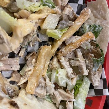 Hush Hush Cafe - Inside of Chicken Shawarma Wrap minus tomatoes - Lebanese Near Me - Lake Oswego, Oregon Hush Hush Cafe - Inside of Chicken Shawarma Wrap minus tomatoes - Lebanese Near Me - Lake Oswego, Oregon