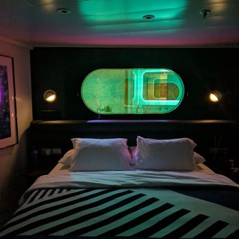 Virgin Voyages - The peek-a-boo shower in the bedroom - Boat Tours Near Me