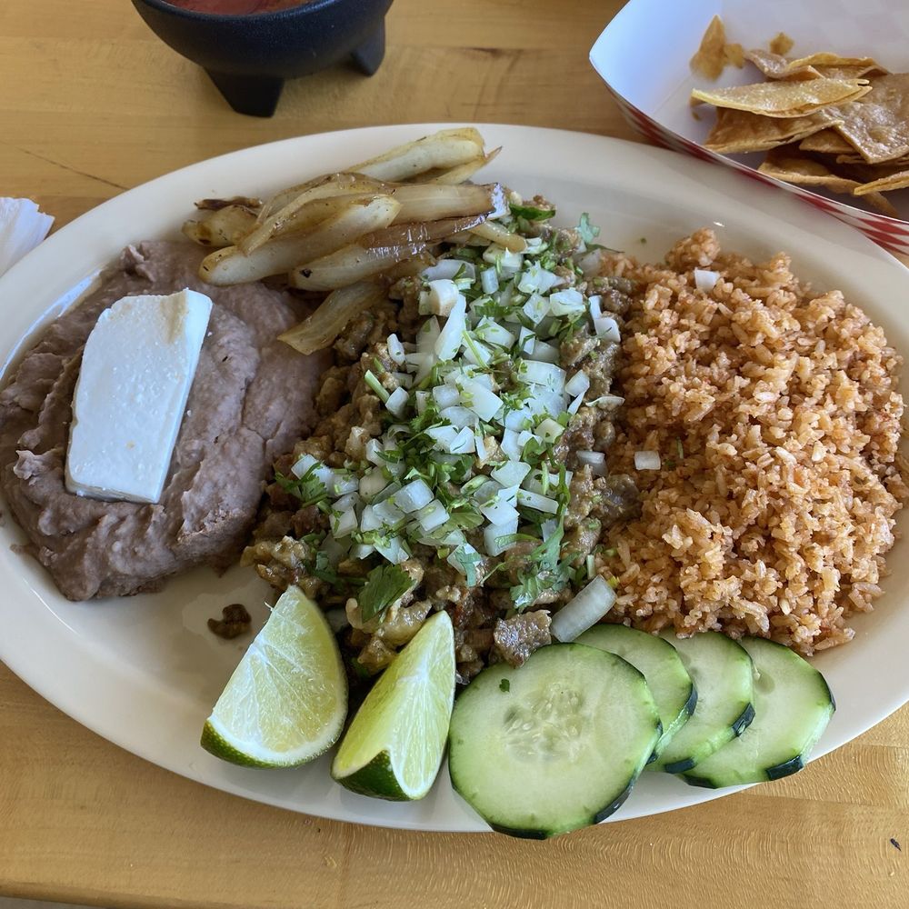Custom plate of chopped chile verde. Custom plate of chopped chile verde.