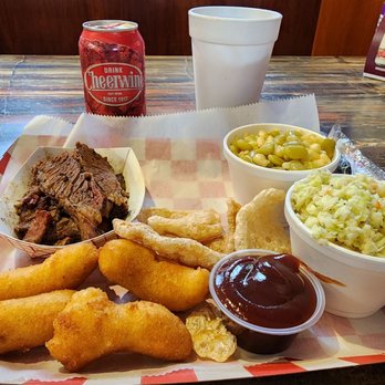 Clyde Cooper's Barbecue - Tray of the beef brisket with corn and butter beans and cole slaw along with a Cheerwine. Yum! - Barbeque Near Me - Raleigh, North Carolina