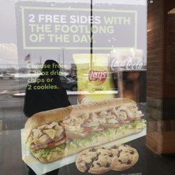 Subway - Current promotion, Get two free sides with a foot-long of the day
