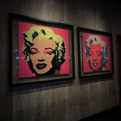 Cactus Club Cafe - Picture of M Monroe on the wall facing the lounge area.