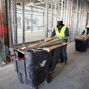 First Onsite - two men in safety vests working on a construction site - General Contractors Near Me - Calgary, Alberta First Onsite - two men in safety vests working on a construction site - General Contractors Near Me - Calgary, Alberta