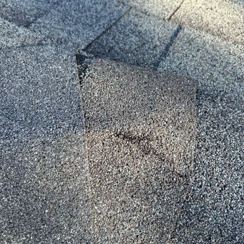 Ehrodz Roofing & Construction - Hip shingle starting to crack - Roofing Near Me Ehrodz Roofing & Construction - Hip shingle starting to crack - Roofing Near Me