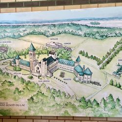 Abbaye Saint-Benoit - An overview map of the abbey and its grounds, right inside the main entrance / April 2024