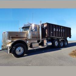 Dave's Roll Off Service - truck with a 30 yd. dumpster