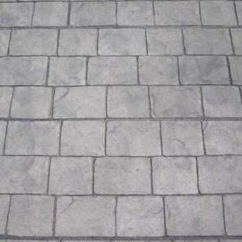 BlueRock Concrete Contractors - a close up view of a cobble stone sidewalk - General Contractors Near Me - Houston, Texas