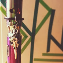 Island Vaporium - Close up of my tank, battery, and charm