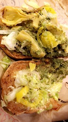 Photo of Ike's Sandwiches - Daly City, CA, United States. 1st sandwich. Basically artichoke and sauce. Should have came with avo and cucumbers
